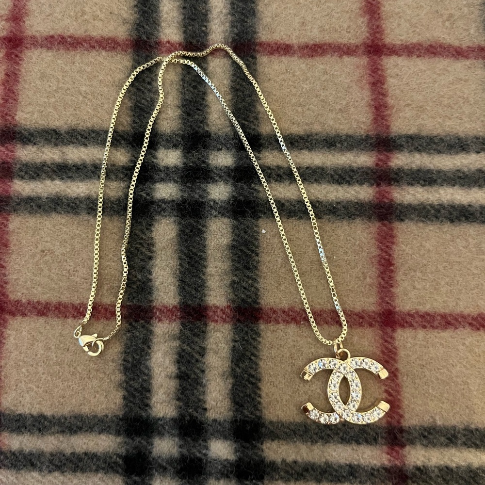 Luxury UPCYCLED Chanel pendant with crystal stone Accents